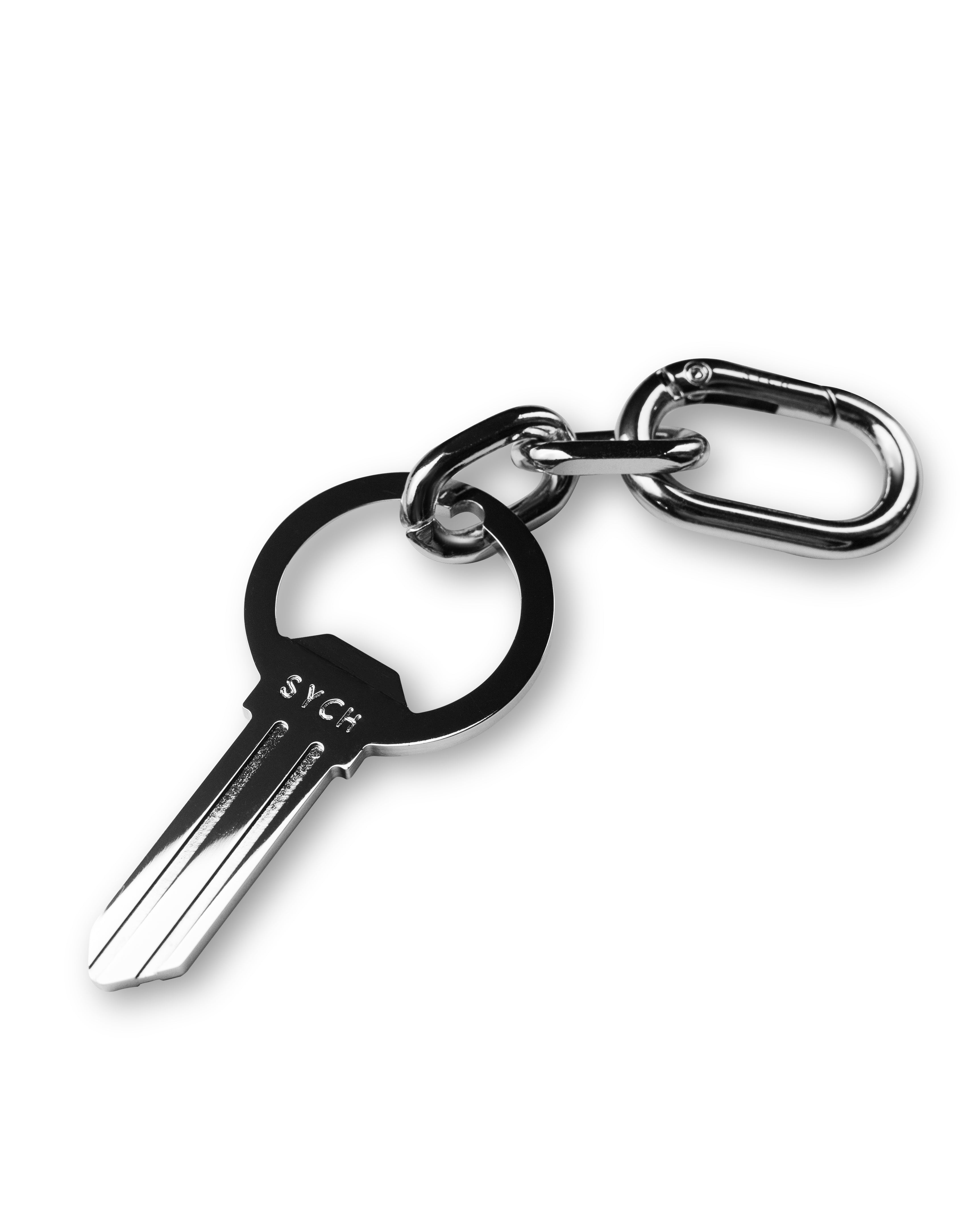 Sych brand silver bottle opener keyring in the shape of a key with a chain on a white background